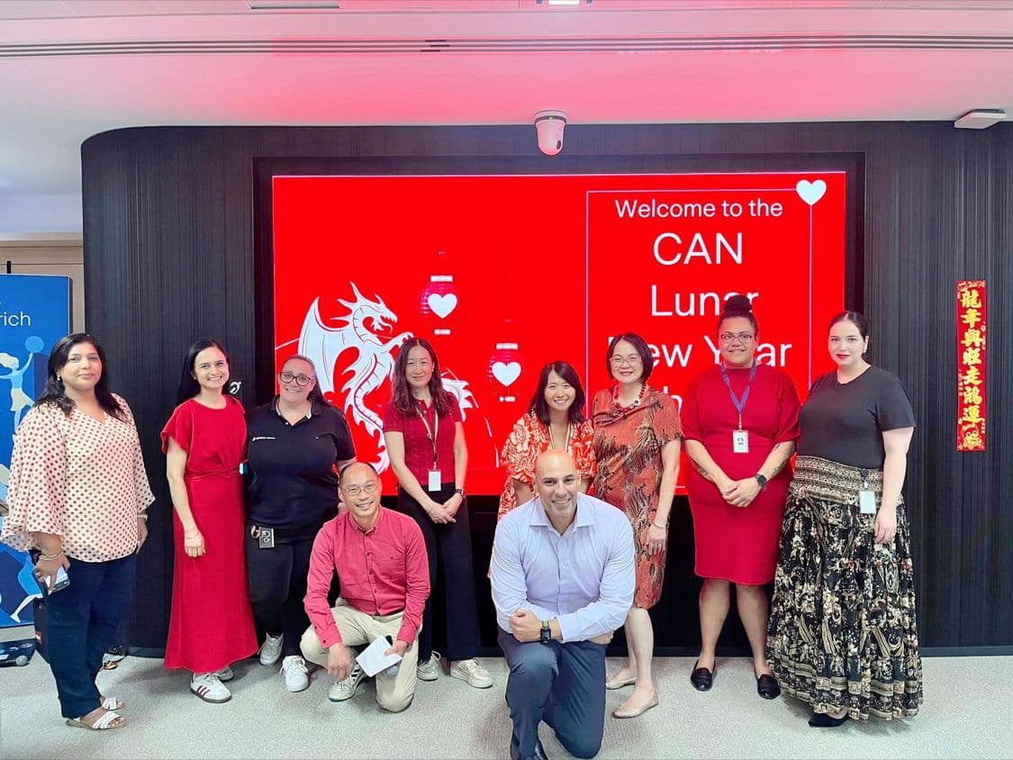 Evelyn Foong with colleagues at a Zurich Lunar New Year celebration
